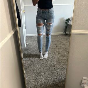 Women's Light Blue Distressed Jeans